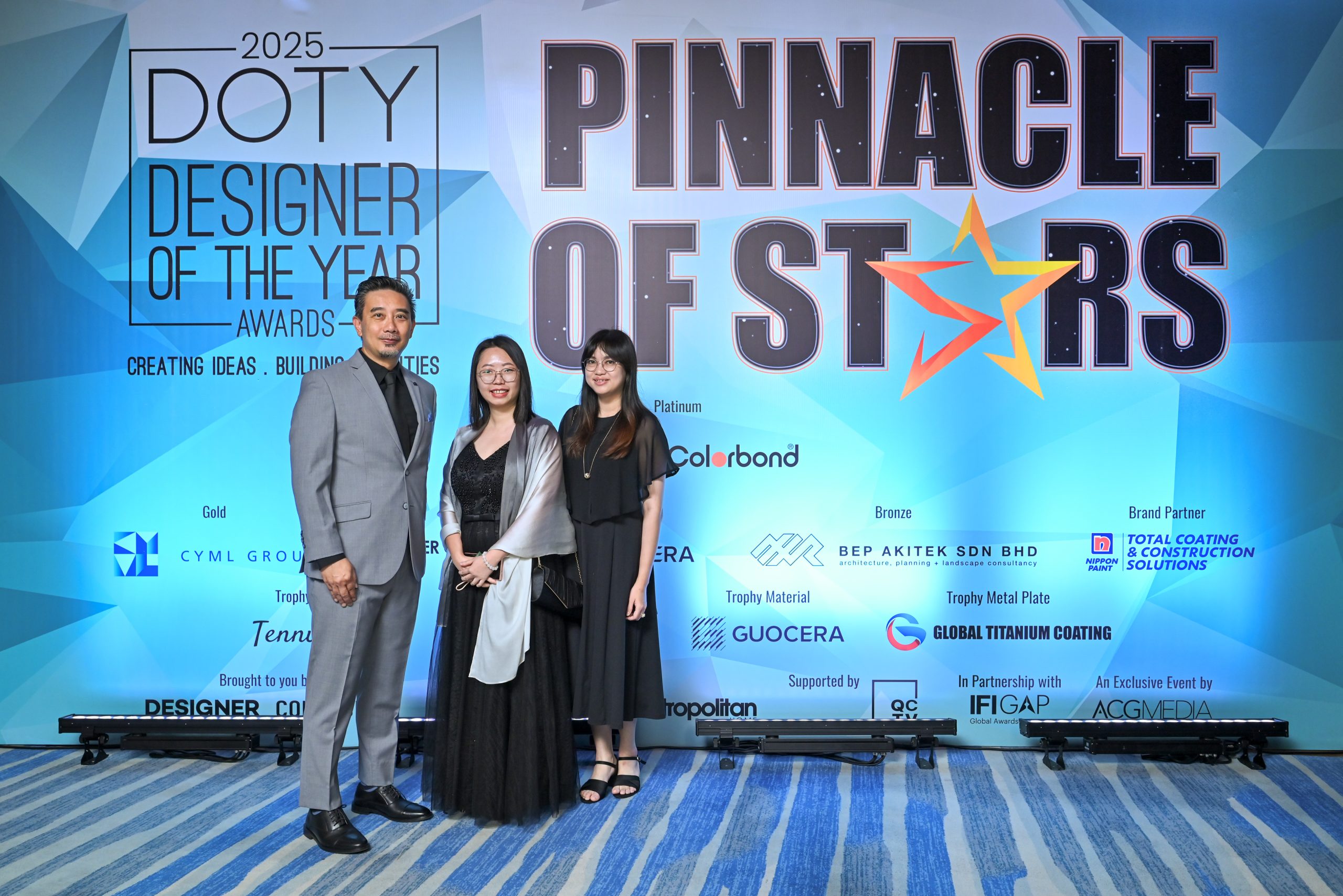 Interior design team from Young Concept Design celebrating their award at Pinnacle of Stars event.